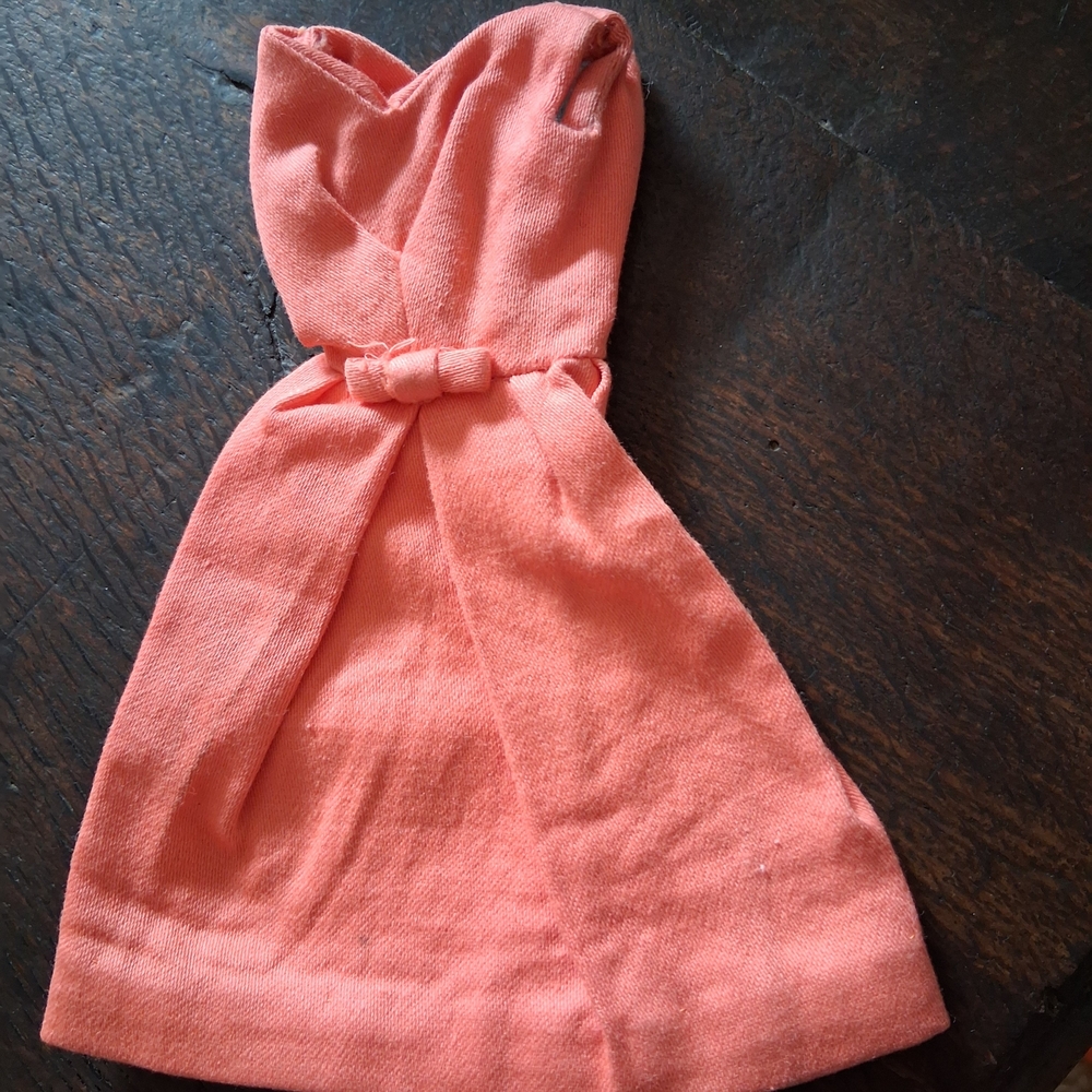 Handmade coral doll dress.